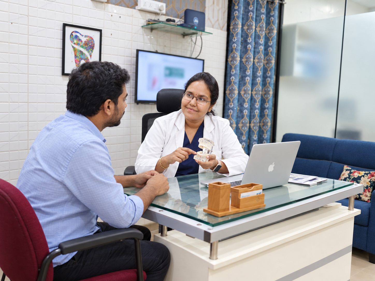Dr. Divya discussing treatment options with a patient